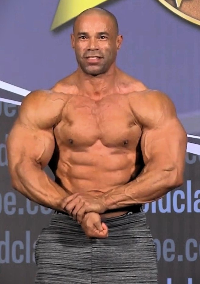 Kevin Levrone posing on stage at the 2016 Arnold Classic Europe